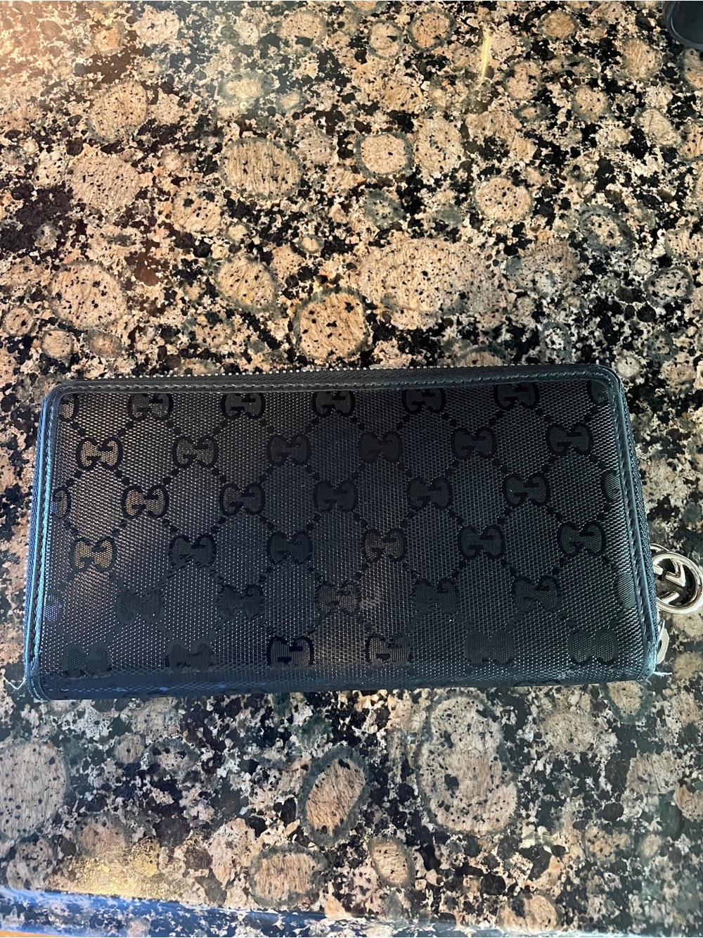 Gucci Black GG Embossed Zip Wallet